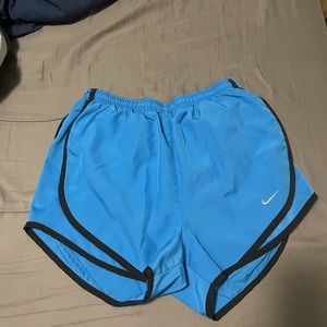 Blue Nike women’s running shorts